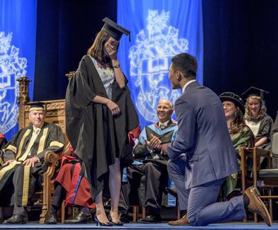 Shiyi Ying popped the question to Yu-Yen Ou during a Business, Law and Art graduation ceremony.